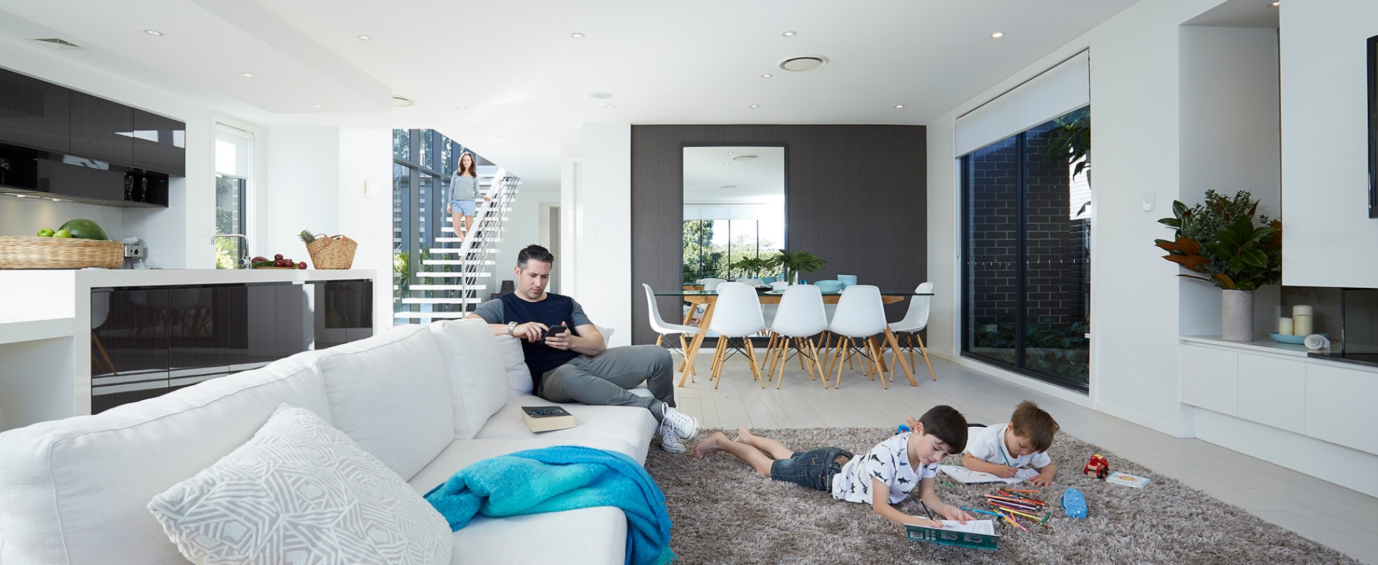 Air Conditioned Lounge with kids playing and dad relaxing